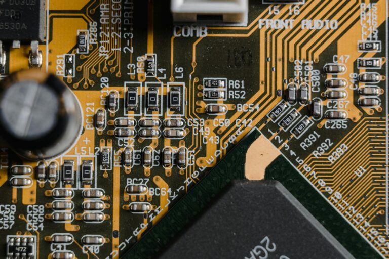 High-resolution close-up of a circuit board showing intricate electronic components and pathways.